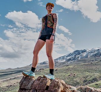 Someone standing on a rock.