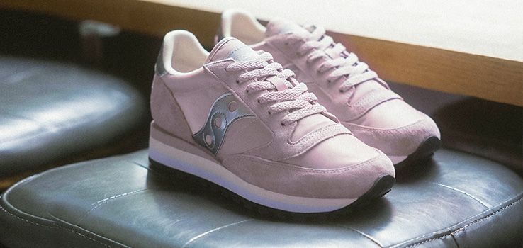A pair of pink Saucony Originals shoes.