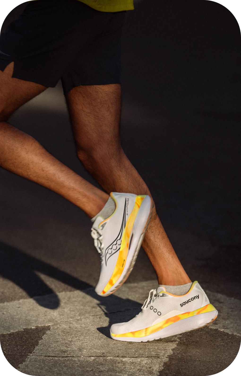 a pair of running shoes on a metal pole
