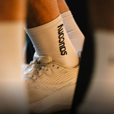 a person wearing white socks
