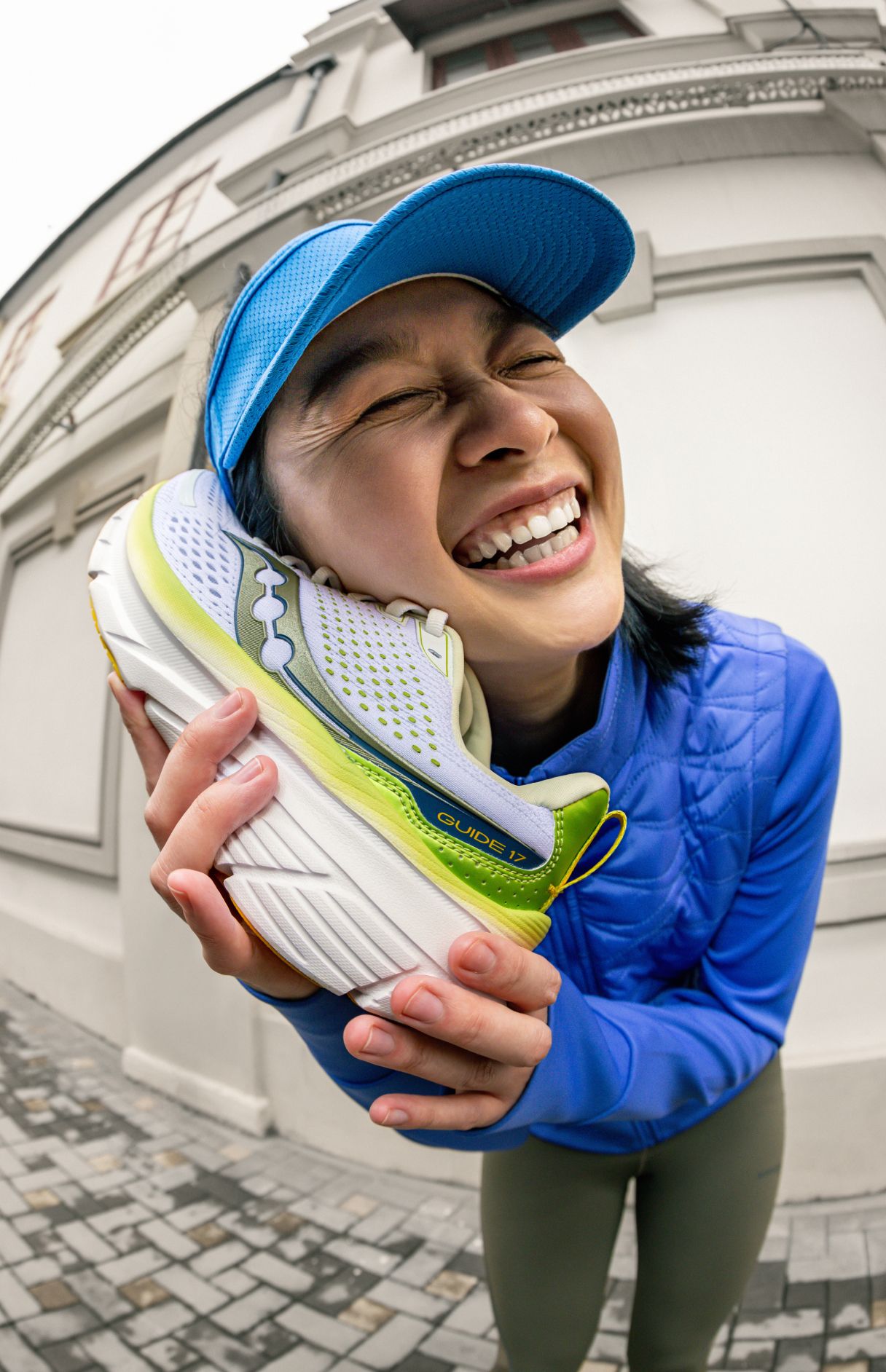 a woman holding a shoe