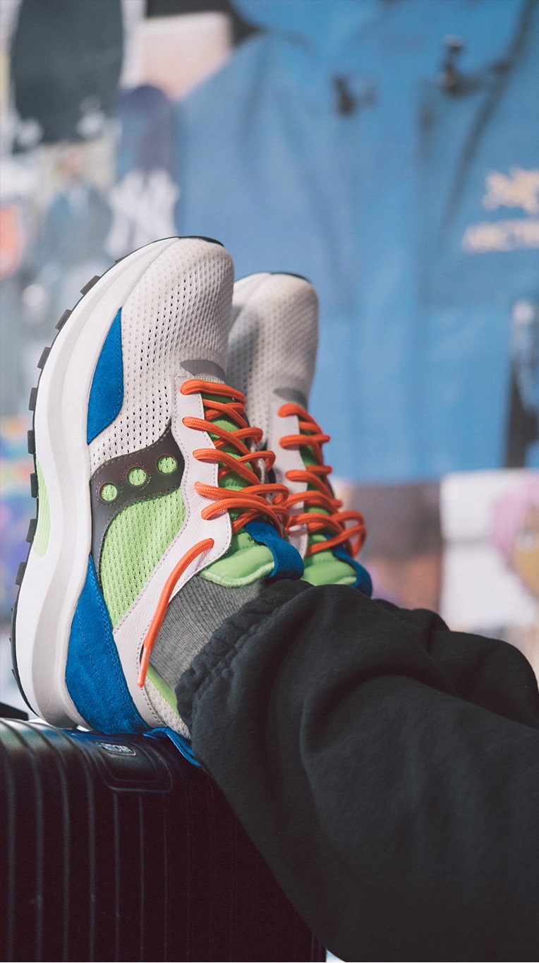 Close up of persons feet wearing Saucony Abstract Jazz shoes.