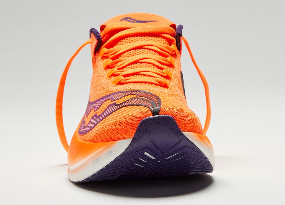 a close up of an orange shoe