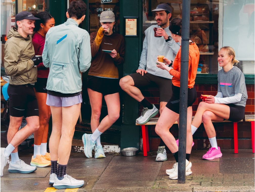 People outside coffee shop wearing Ride 18 shoes