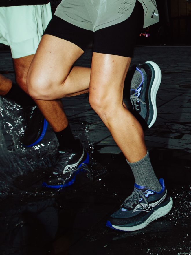 Pair of runners in the rain