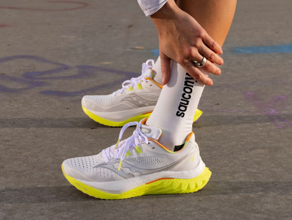People outside coffee shop wearing Ride 18 shoes