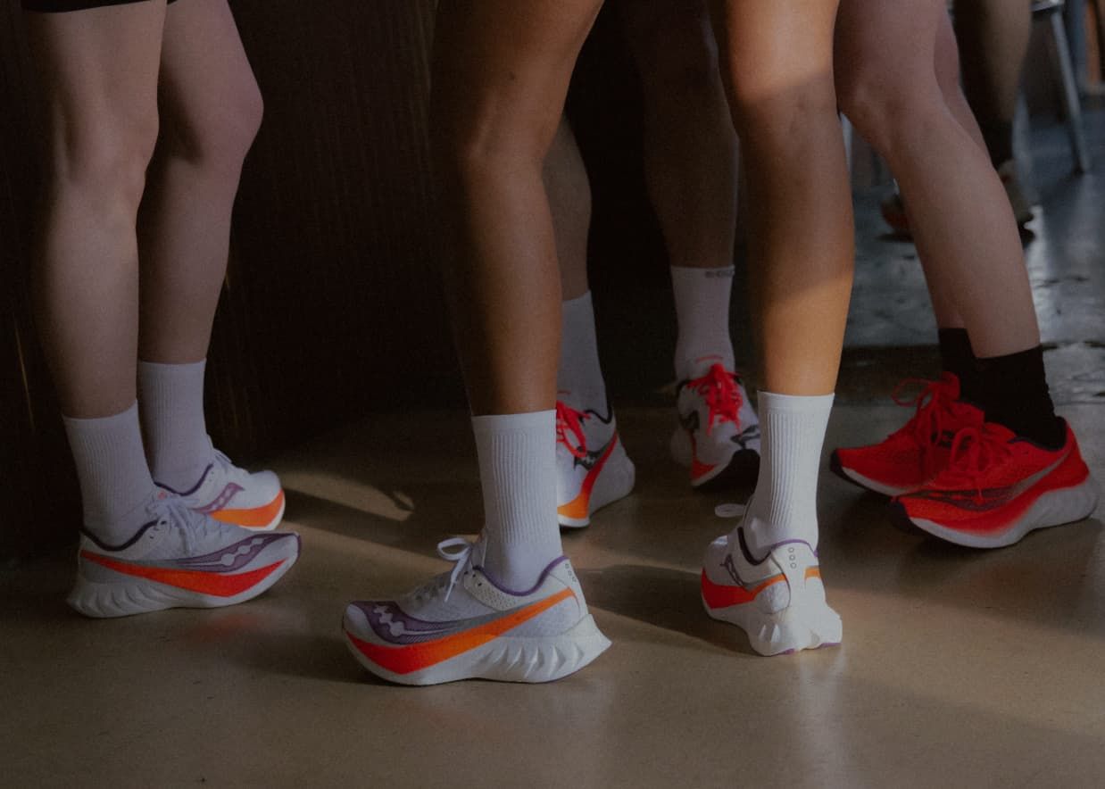 a group of people wearing white socks and white socks