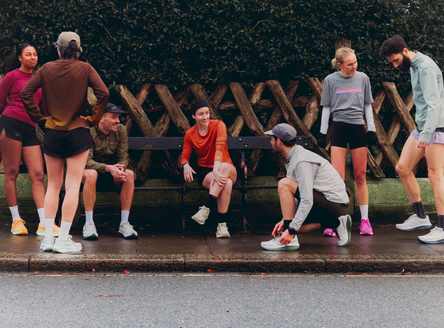 a group of people sitting on a bench
