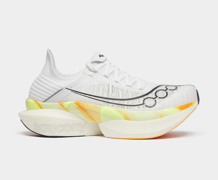 a white shoe with yellow and orange design
