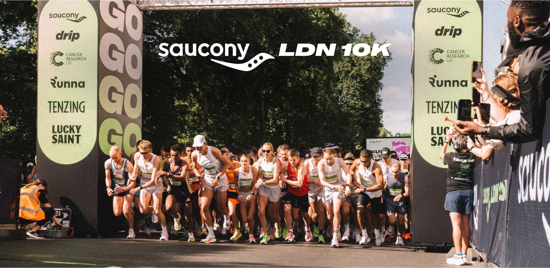 A crowd of people about to race.