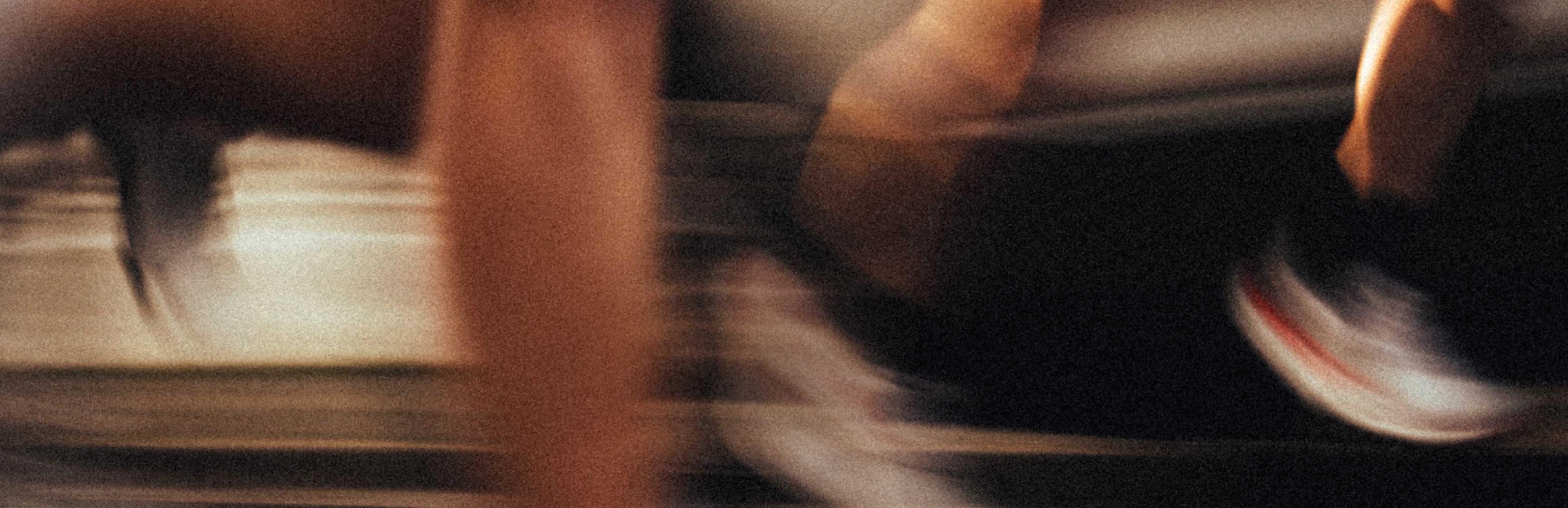 feet in motion running on a track