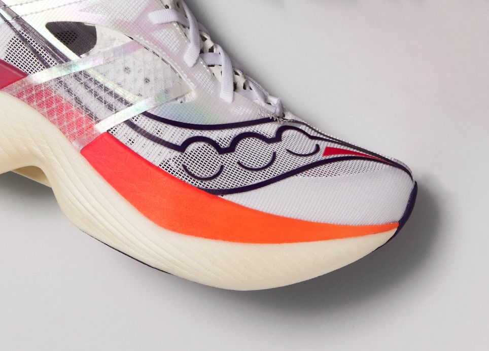 a close up of an orange shoe toe box