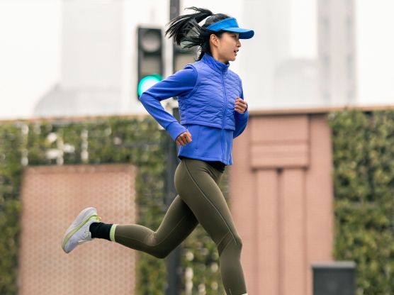 Woman running in the street