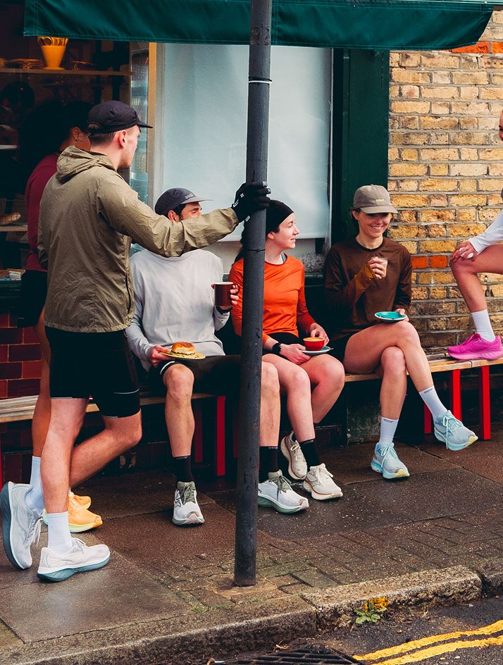 a group of people sitting on a bench