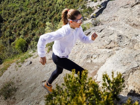 A women hiking up a trail