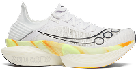 a white tennis shoe with yellow and orange soles