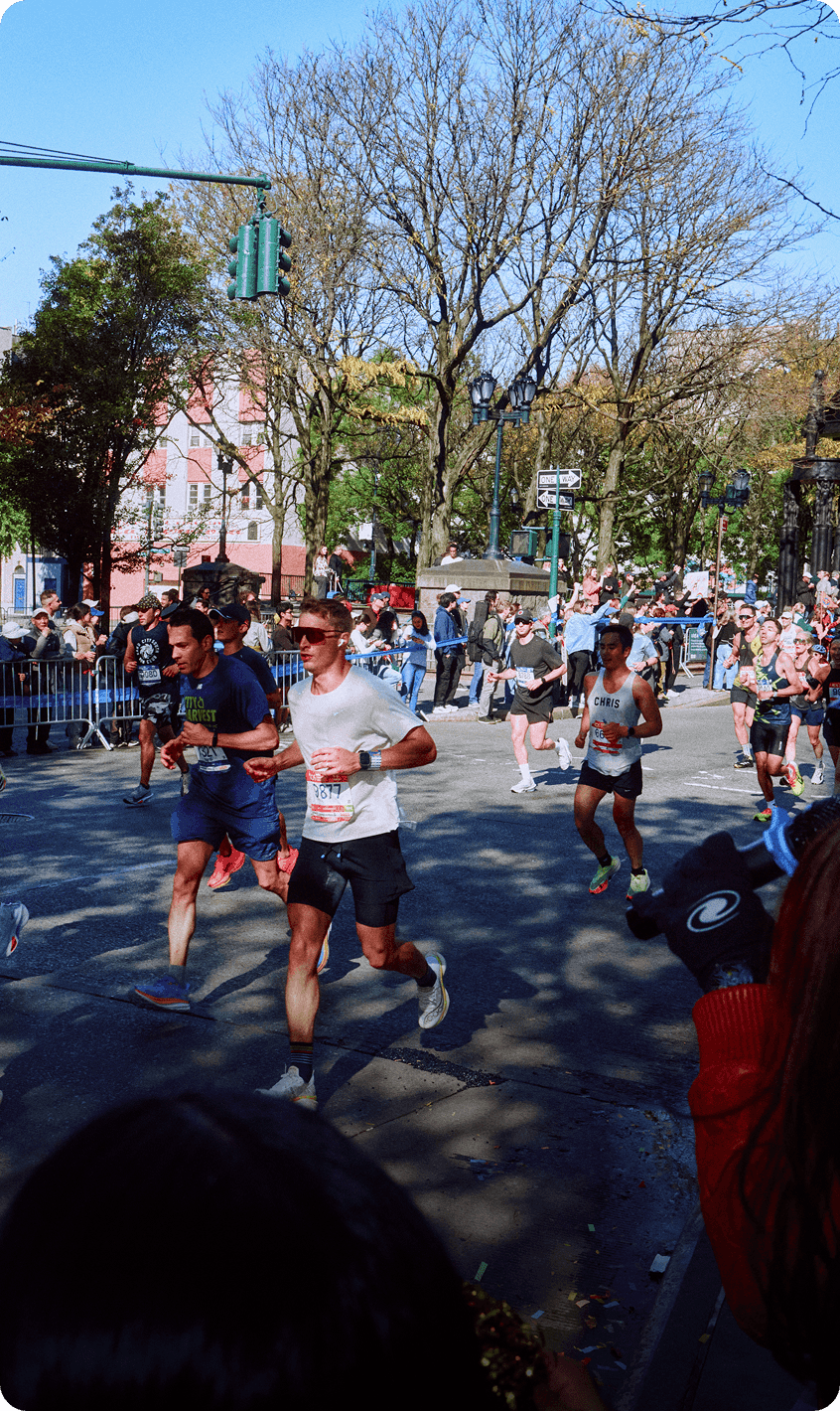 People running wearing Saucony shoes