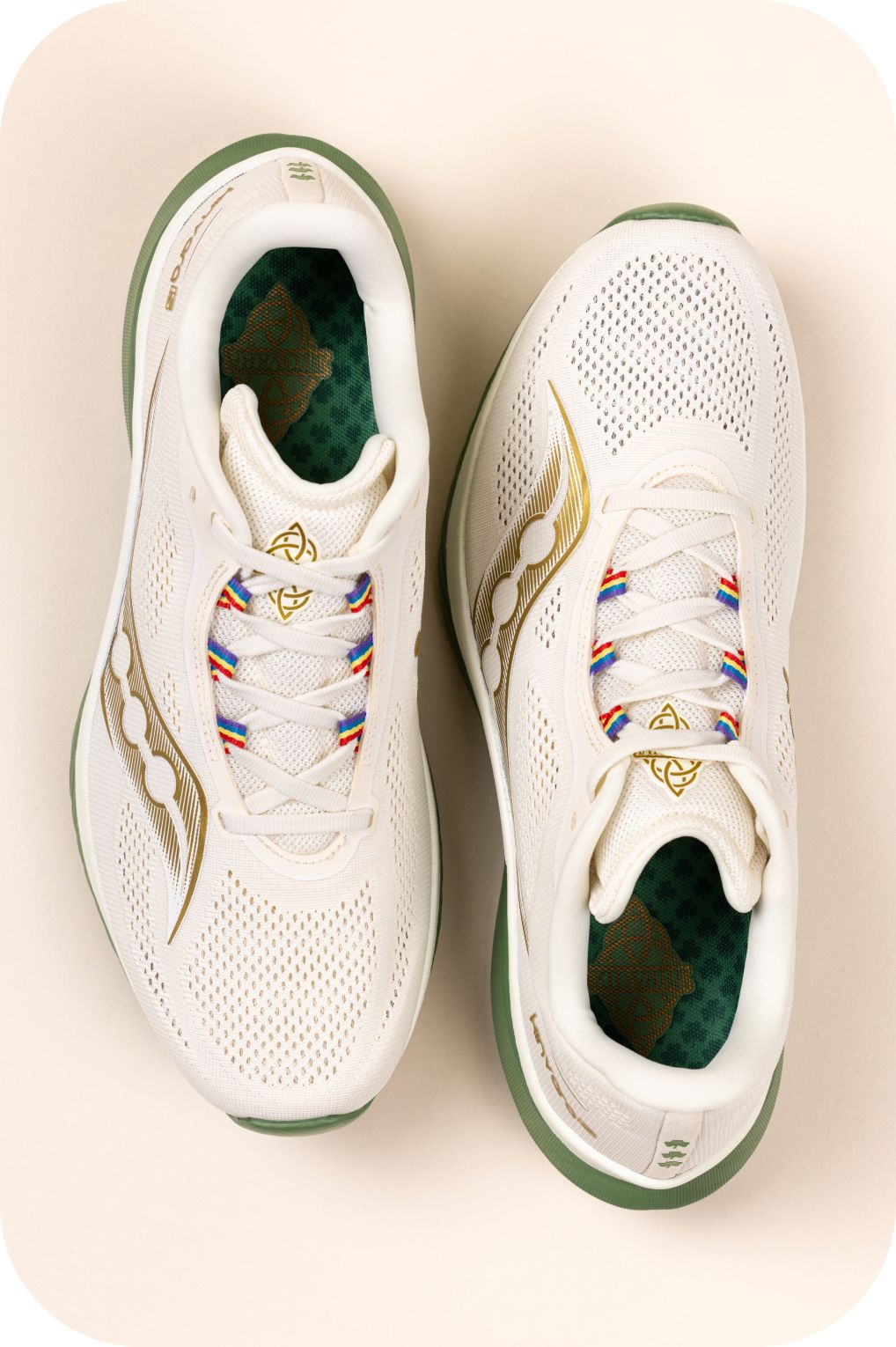 a pair of running shoes on a metal pole