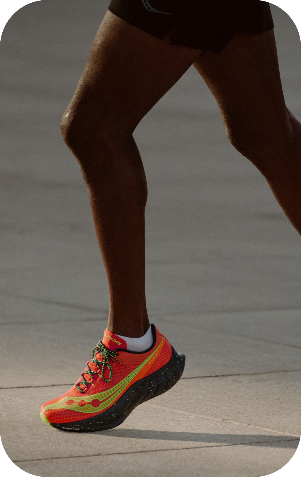a pair of running shoes on a metal pole