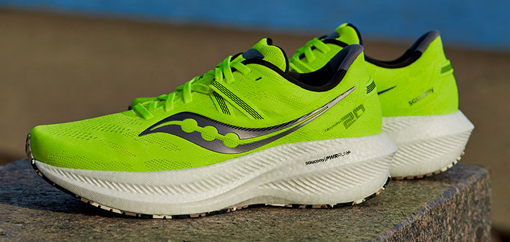 Green Saucony performance running shoes.