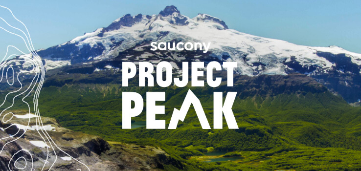 Mountain in background with Saucony Project Peak logo in front.