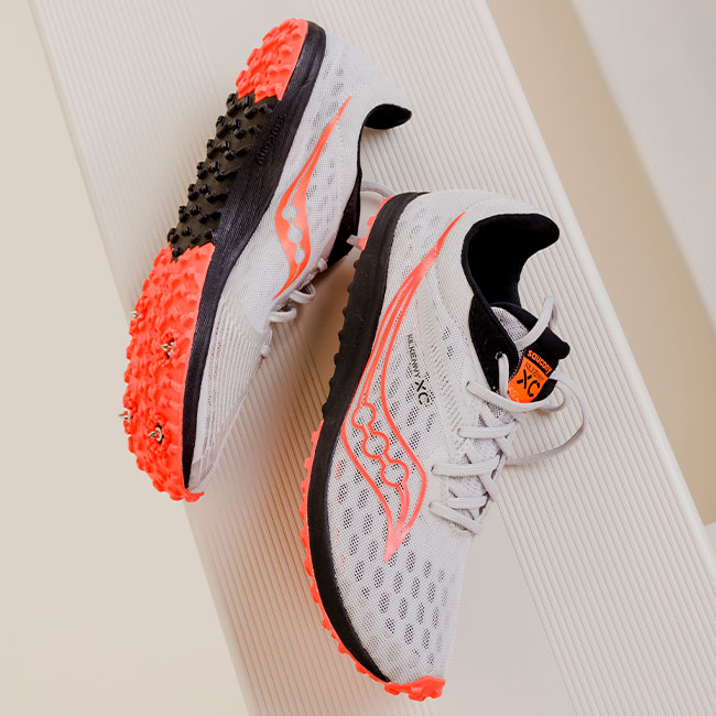orange saucony running shoes
