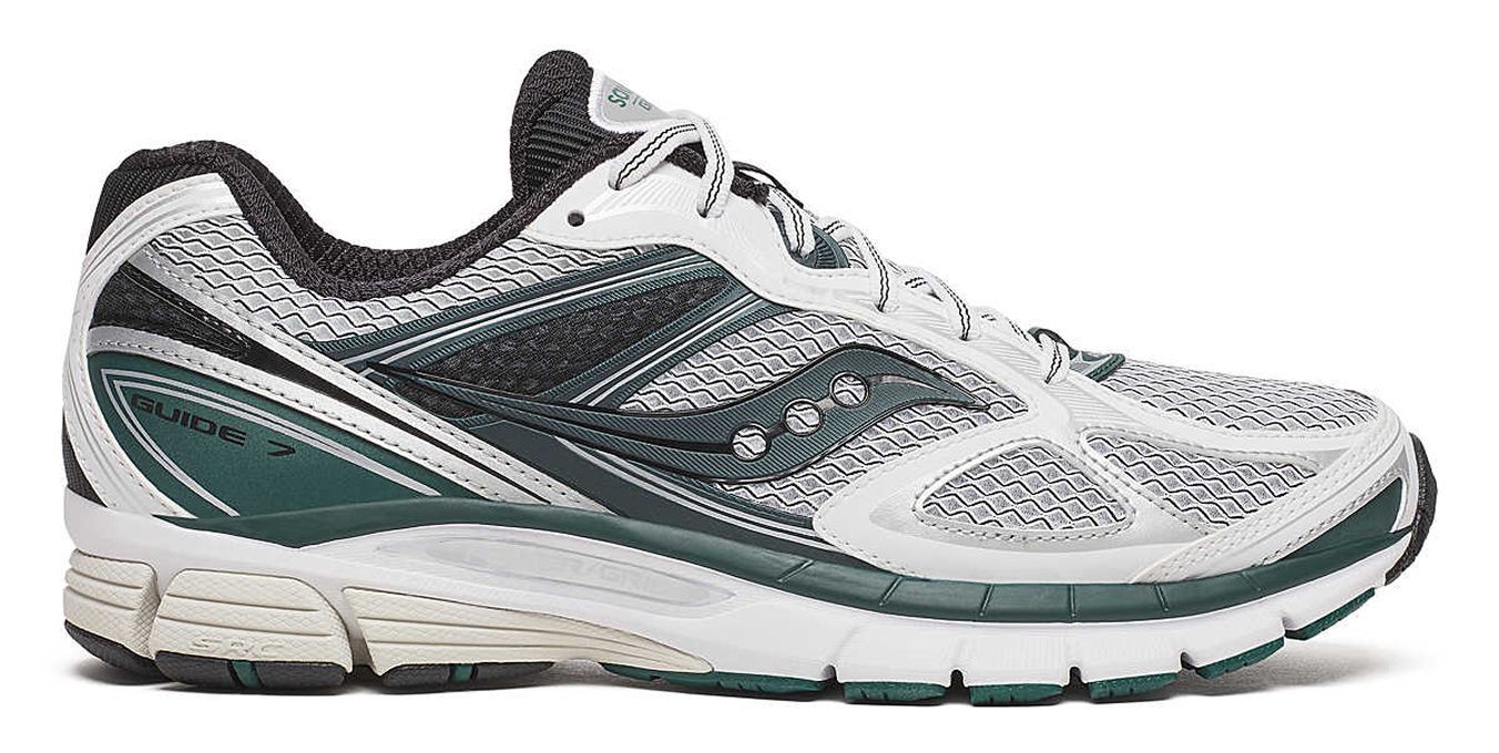 A white and green Guide 7 Saucony shoe.