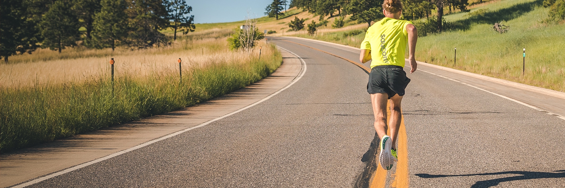 Man running up the road