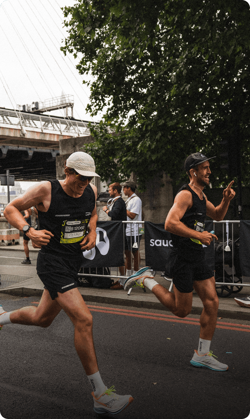 People wearing Saucony gear finishing a race