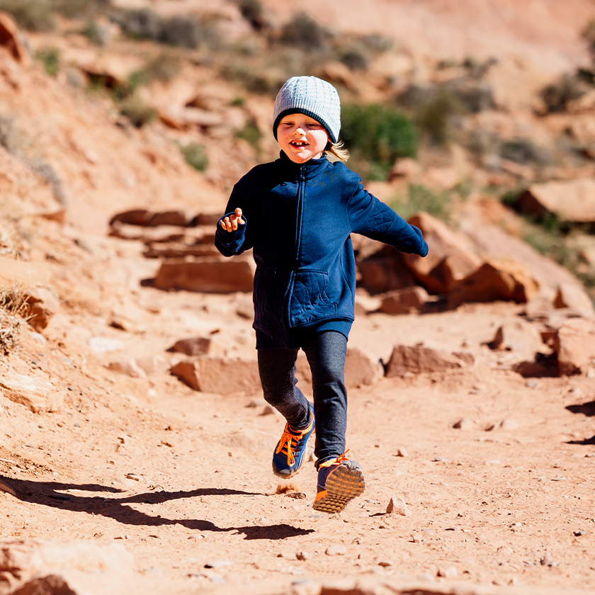 A kid going for a trail run.