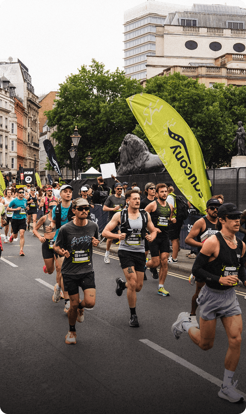 People running wearing Saucony shoes