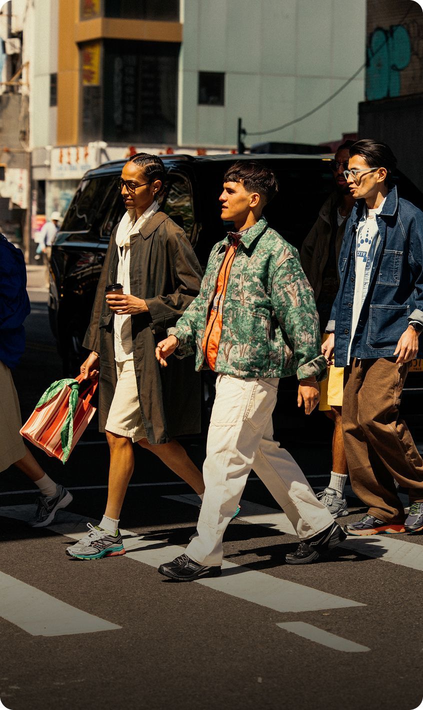 People shopping wearing Saucony shoes.