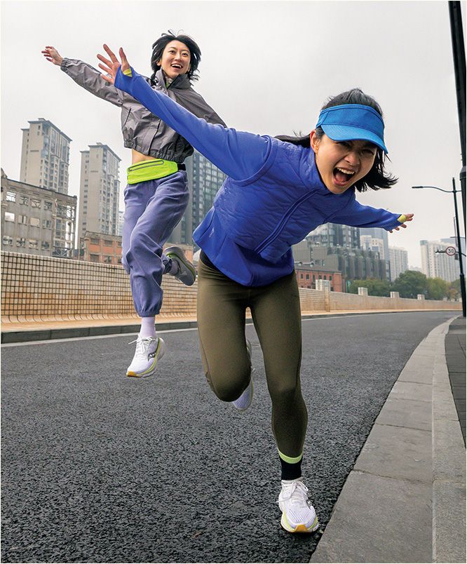 a pair of running shoes on a metal pole